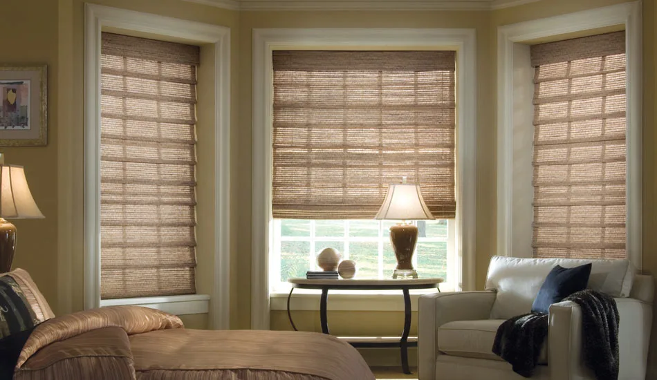 Blinds by Design team adjusting new shades for smooth effortless operation.