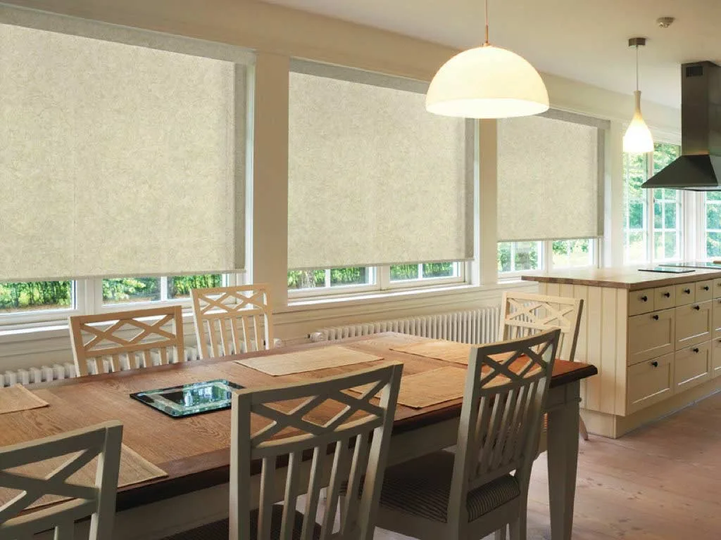 Beautiful living room shades installed by Blinds by Design professionals