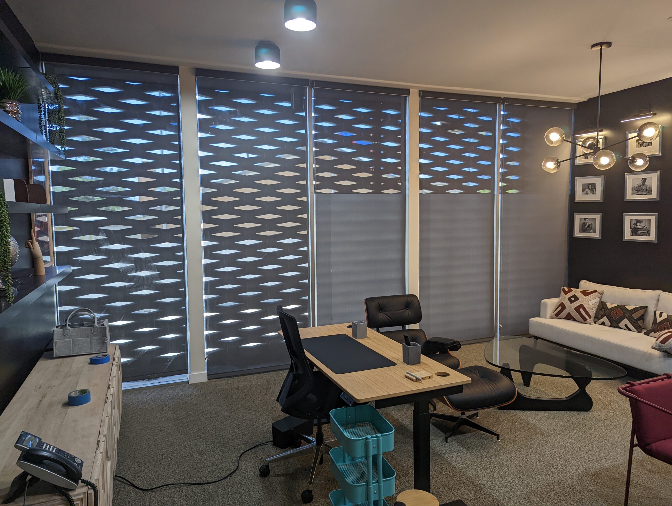 Custom window blinds installed by Blinds by Design near sunny window