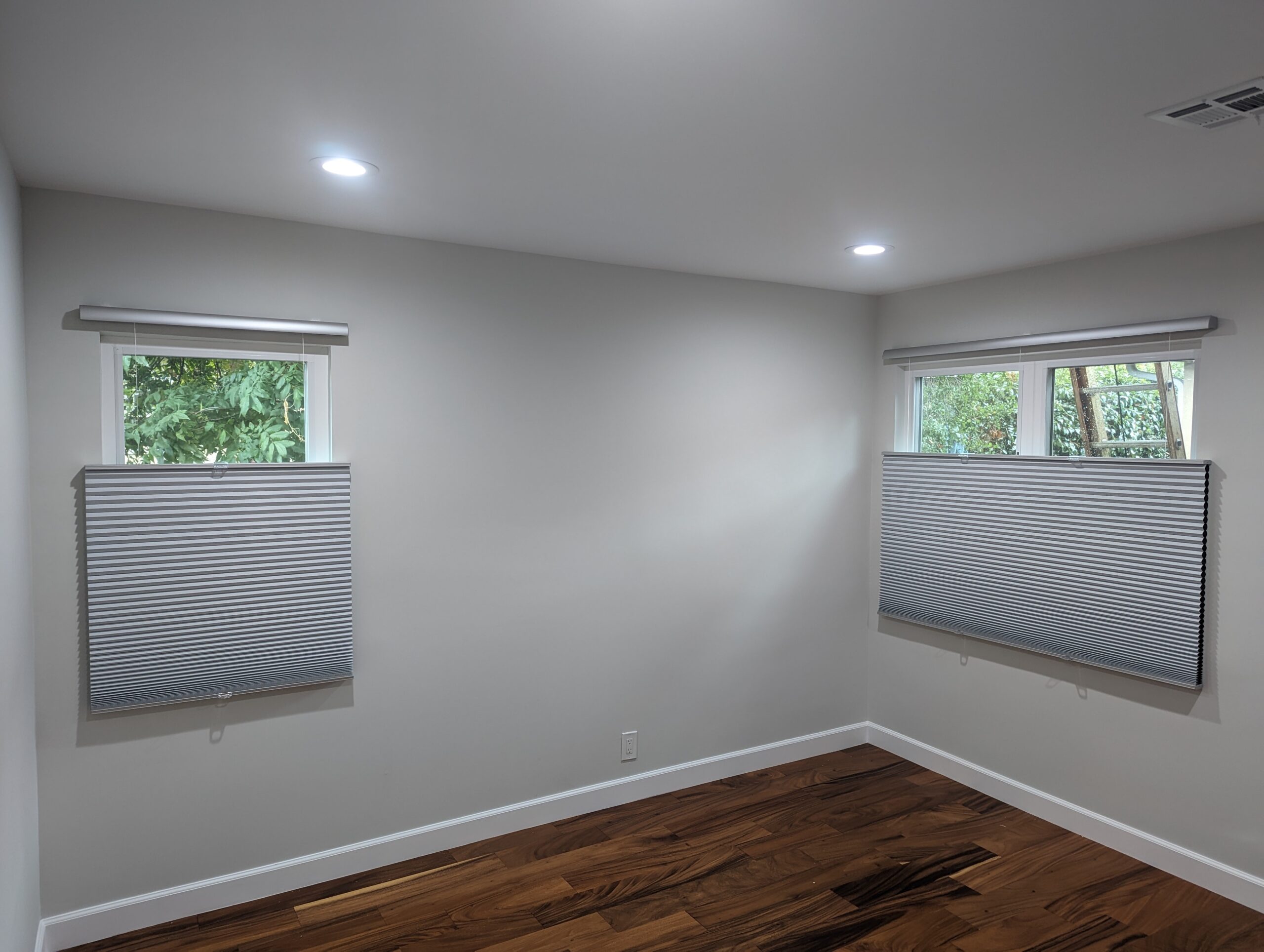 Modern window shades installed professionally enhancing home energy efficiency instantly.