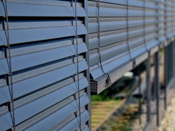 Skilled technicians handling precise blinds replacement projects