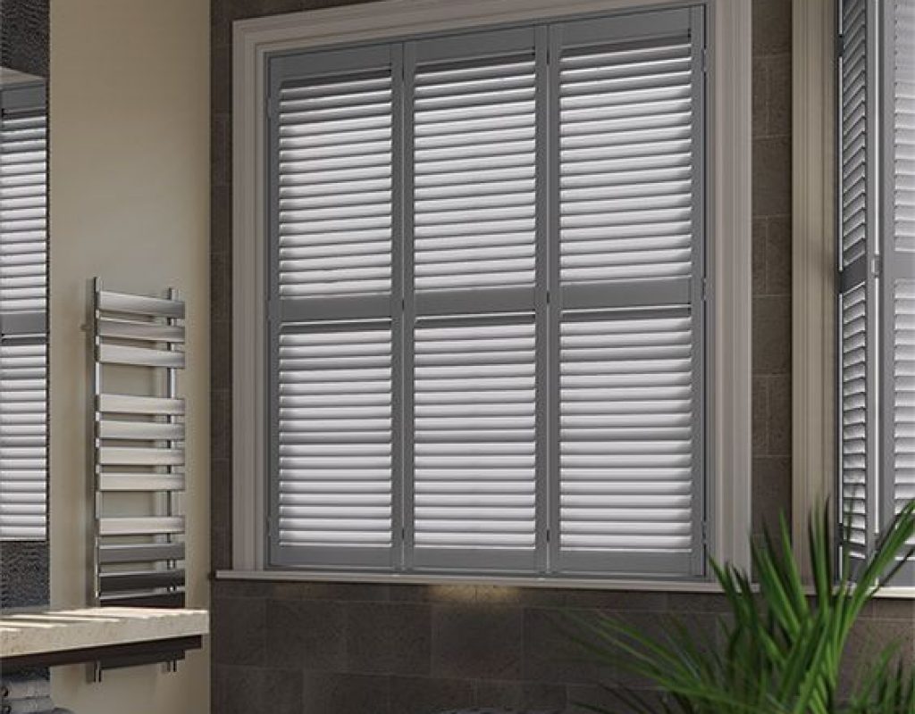 Custom wooden shutters on a La Mirada home's front window